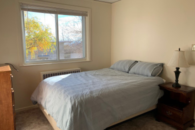 Tres Casitas bedroom with carpet