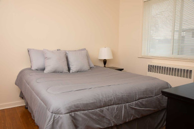 Tres Casitas bedroom with wood floor